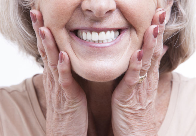 Dentures Older woman smiling with dentures